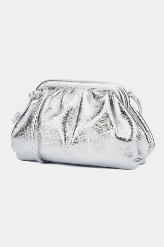 NIKKI-A METALLIC CLUTCH CROSSBODY sold by Lord & Taylor
