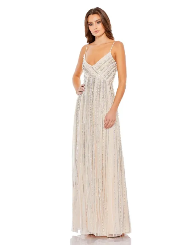 Embellished Spaghetti Strap Wrap Over A Line Gown sold by Lord & Taylor