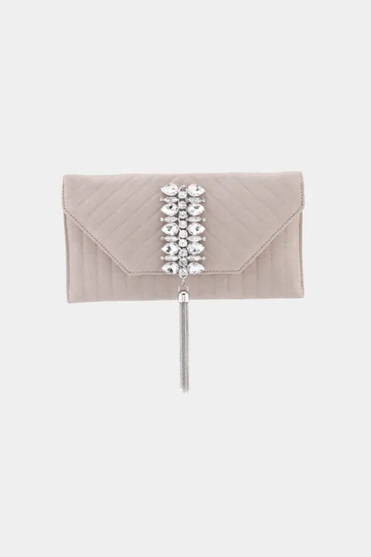 Quilted Faux Suede Clutch sold by Lord & Taylor