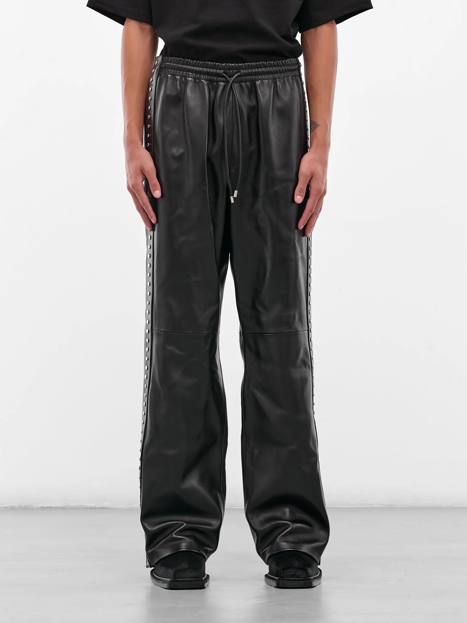 Black Studded Lambskin Elasticated Pants (H526Y54L71-1100-BLACK) sold by lorenzo