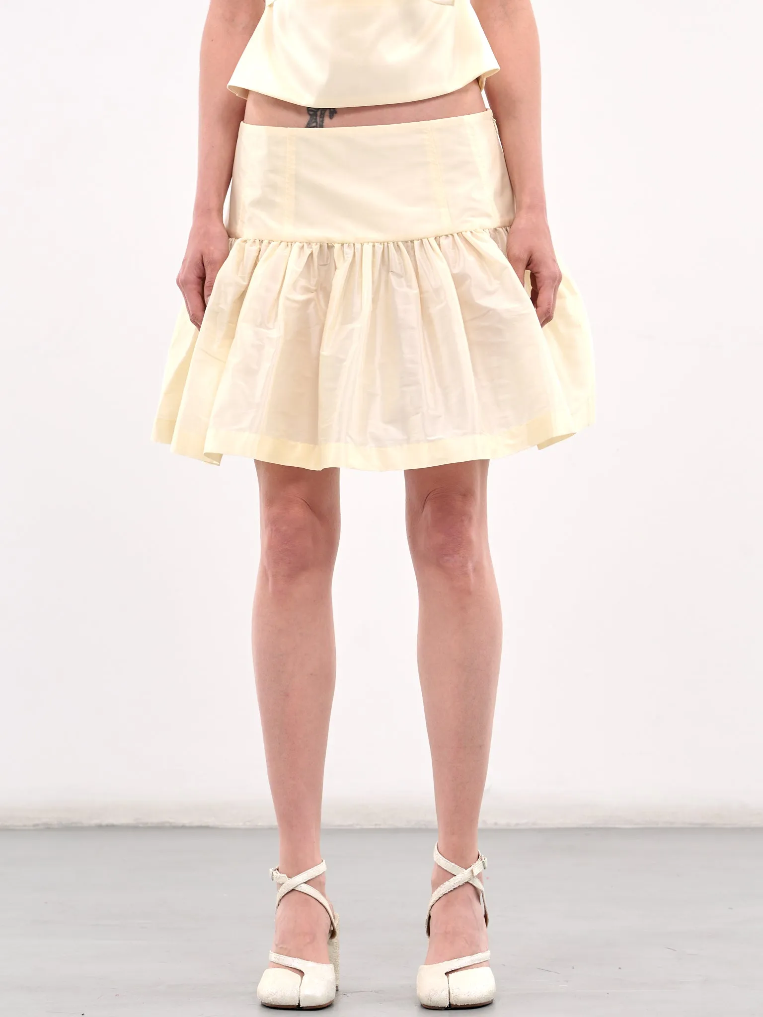 Blaise Mini Skirt (47-IVORY) sold by lorenzo