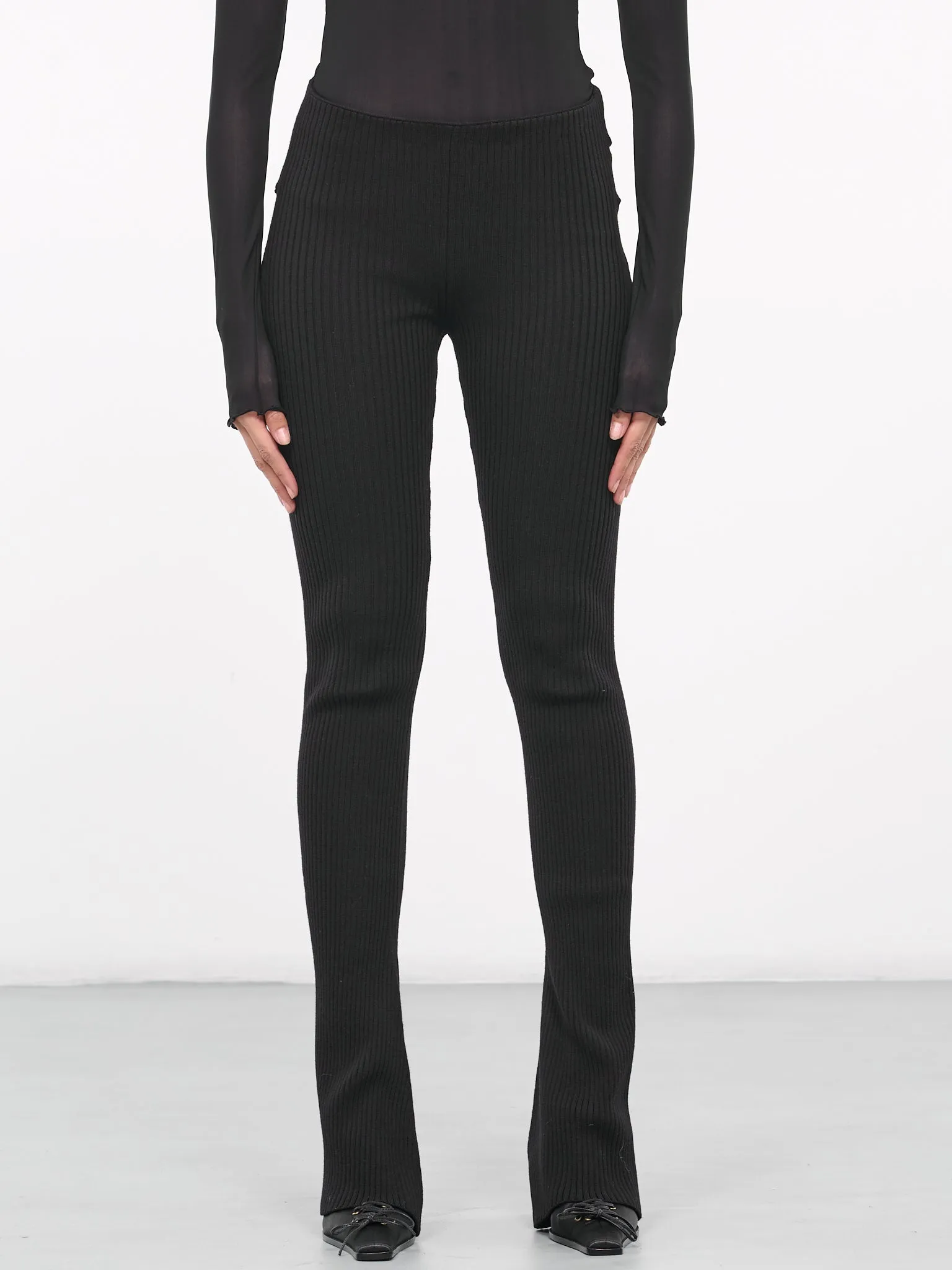 Buttoned Knit Pants (23-15-F-PA090-M057-BLACK) sold by lorenzo
