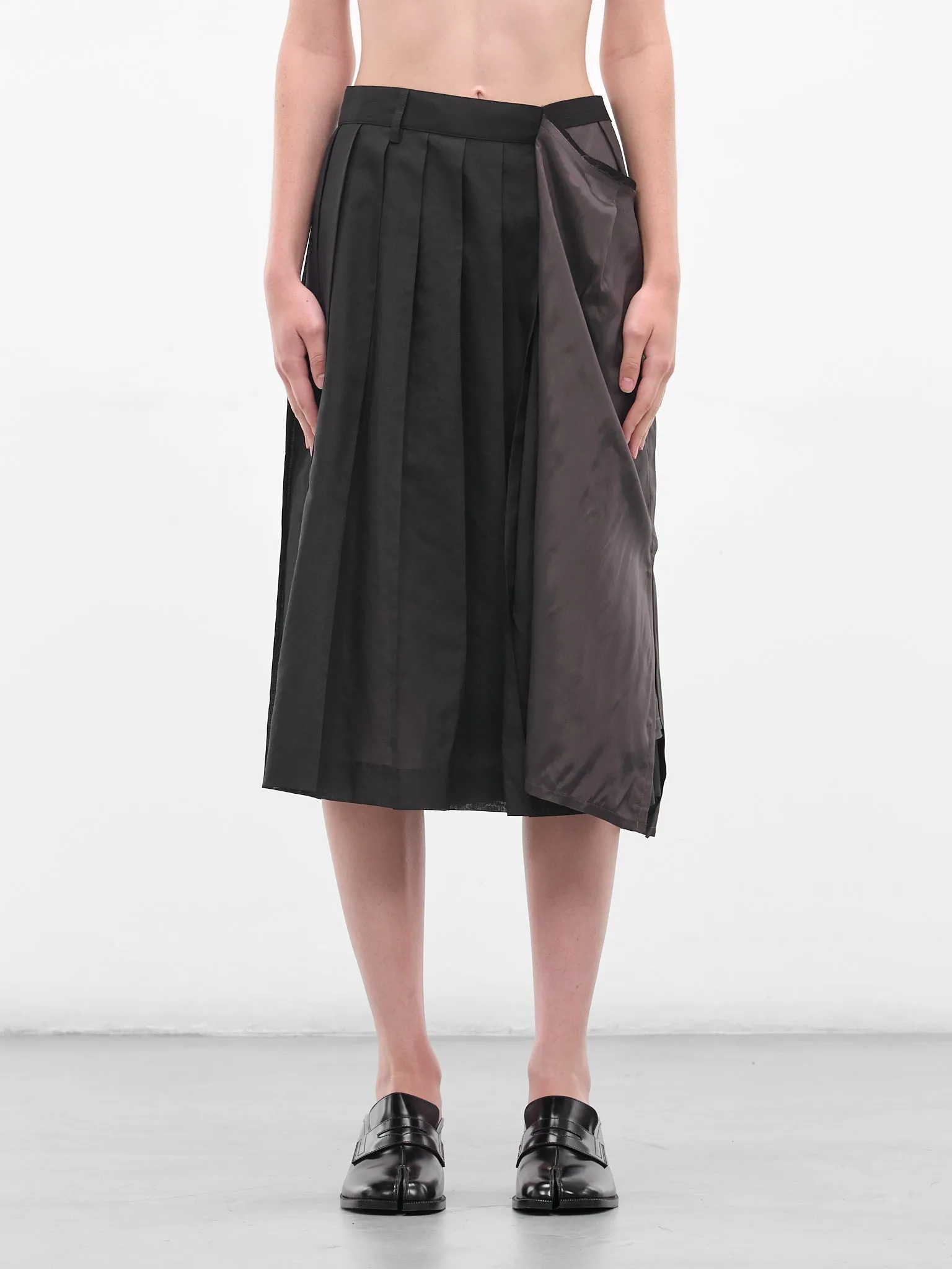Black Deconstructed Asymmetric Midi Skirt (S51ME0043-MTN098-900-BLACK) sold by lorenzo