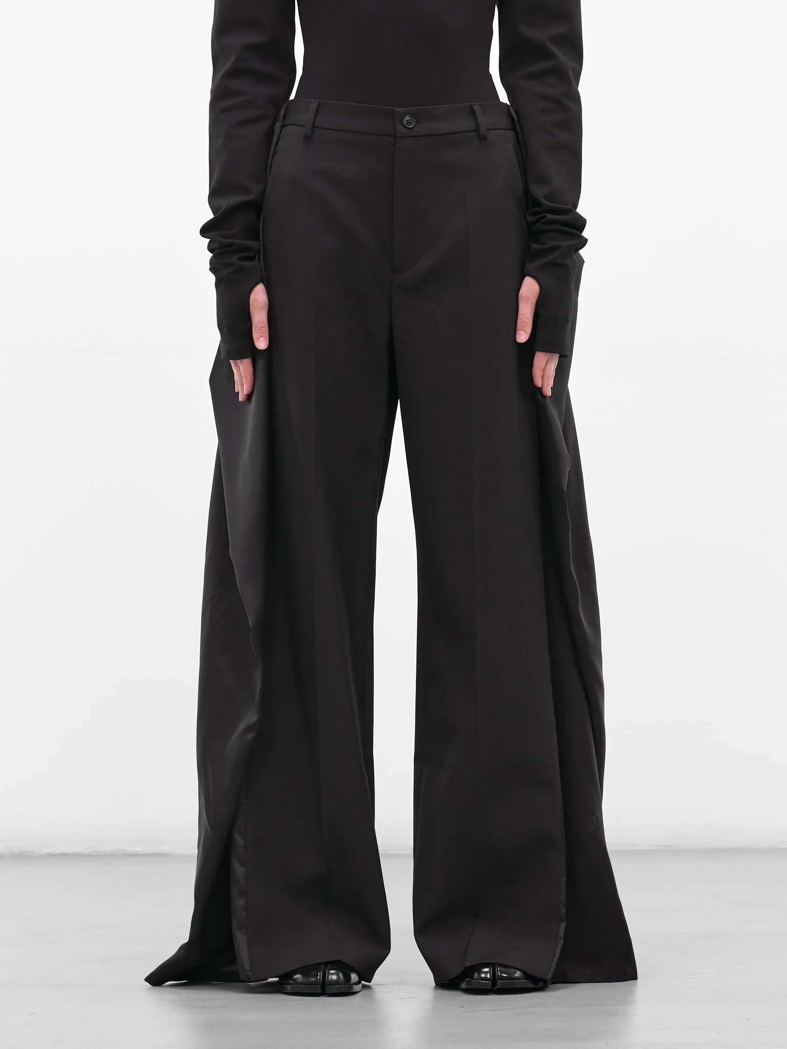 Black Deconstructed Wrap Layering Trousers (S62KB0246-M35436-899-BLACK) sold by lorenzo