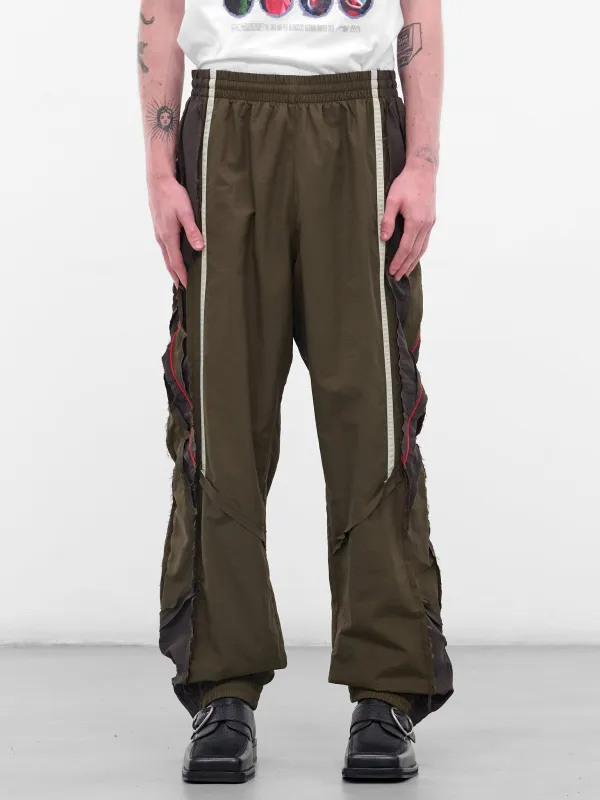 Green Deconstructed Nylon Joggers (120WP01414-GREEN) made by Martine Rose