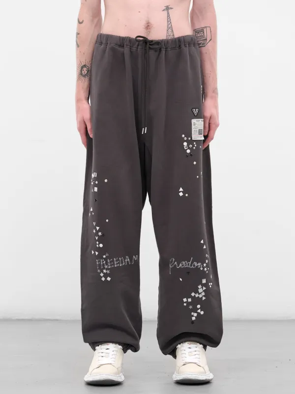 Black Studded Graphic Sweatpants (J15PT724-BLACK) sold by lorenzo