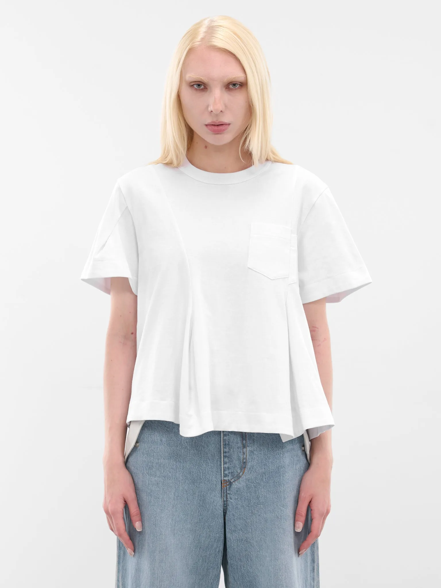 White Asymmetric Drape Pocket Tee (25-08020-101-WHITE) sold by lorenzo