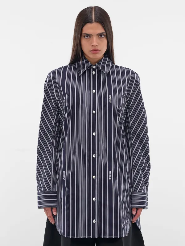 Black Striped Shirt Dress (DRW00686AW00494-STRIPES) sold by lorenzo