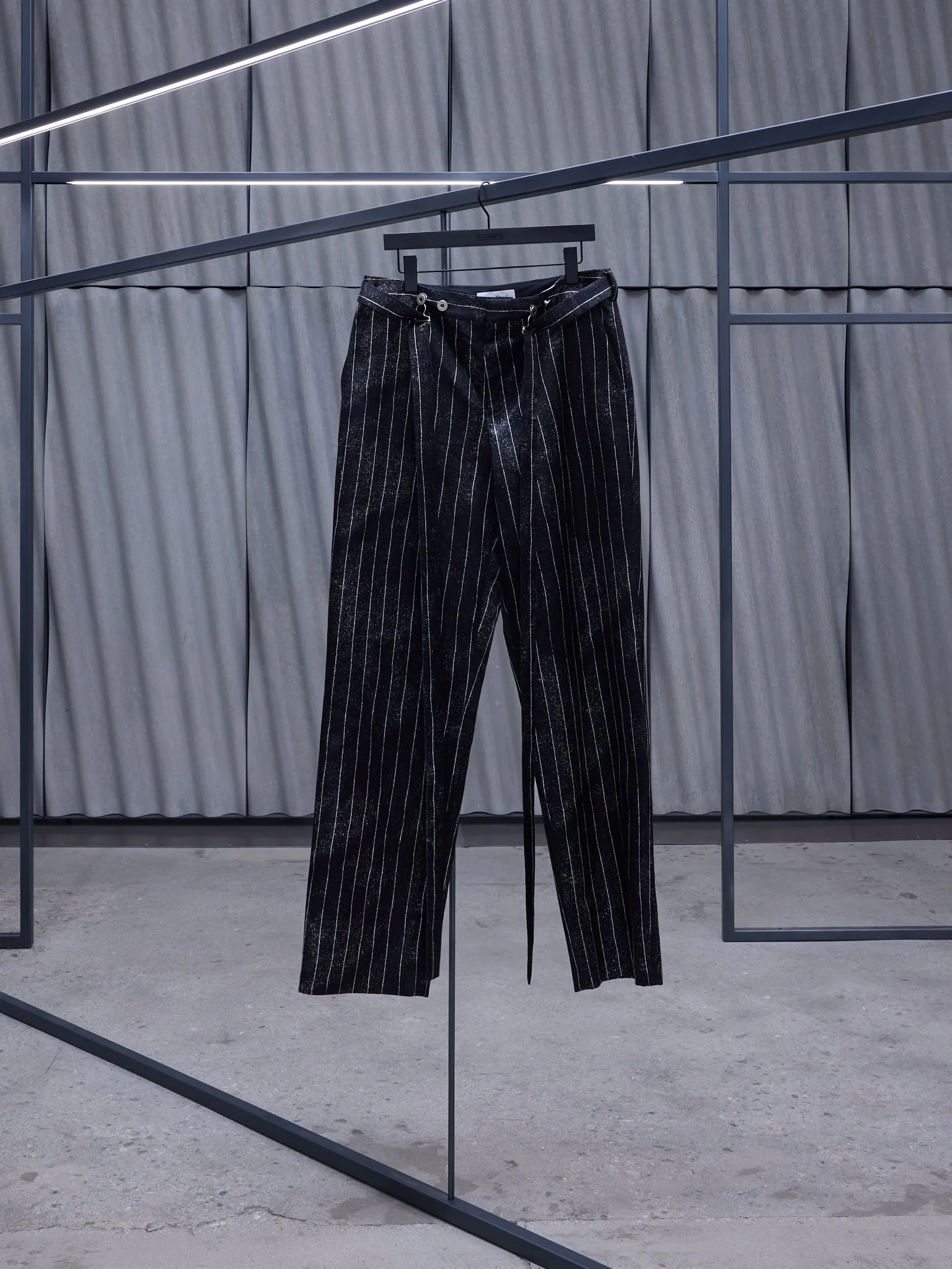 The Satin Pinstripe Wide Pants (F-PA160-C556-0001-BLACK-WHITE) sold by lorenzo