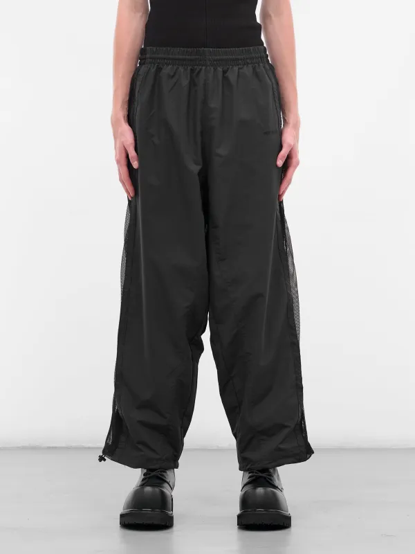 Black Mesh Paneled Track Pants (UH76GP700B-BLACK) sold by lorenzo