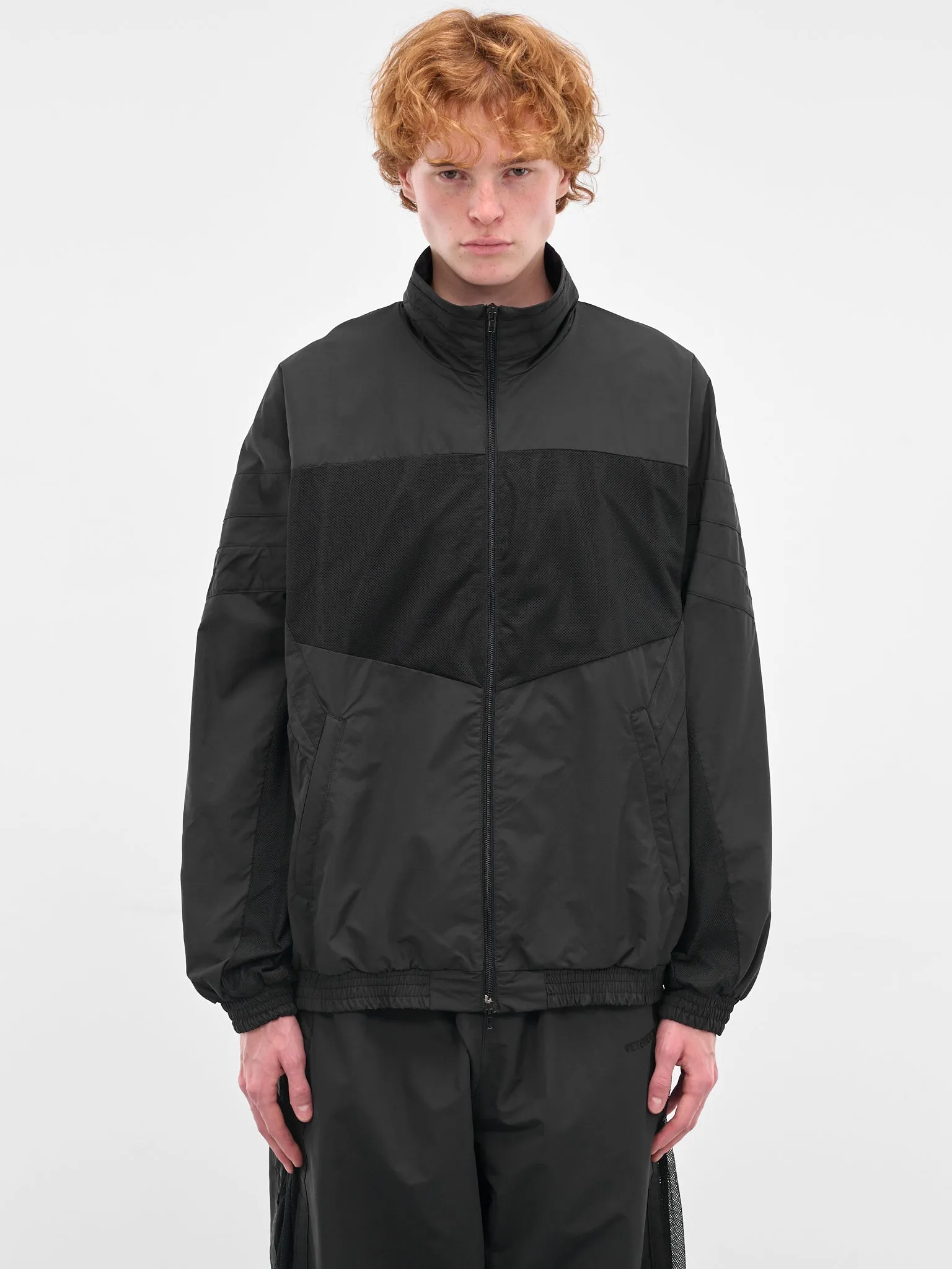 Black Mesh Paneled Track Jacket (UH76GJ700B-BLACK) sold by lorenzo