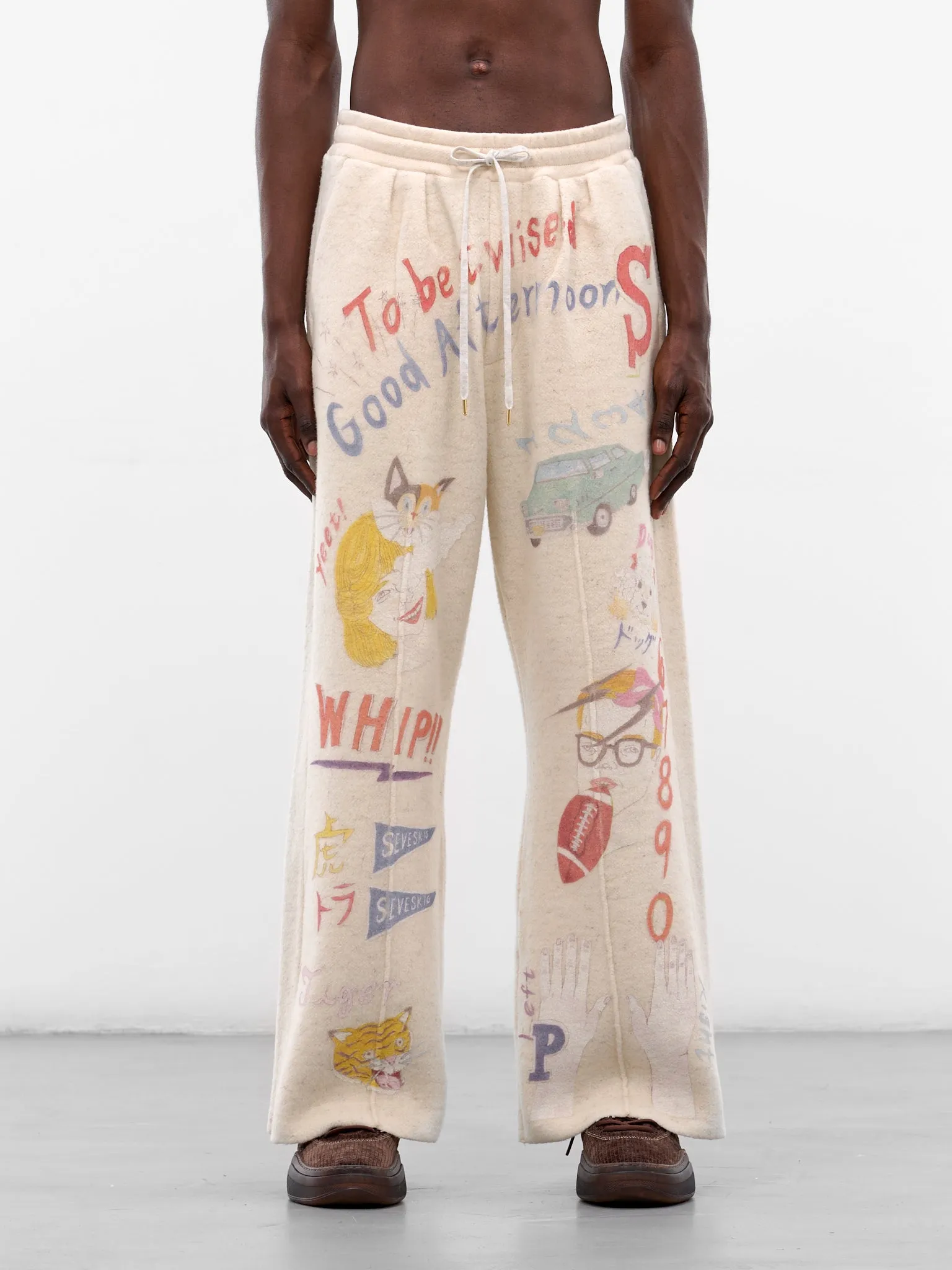 White Graffiti Print Wool Sweatpants (PT-SV-NGA-1012-WHITE) sold by lorenzo