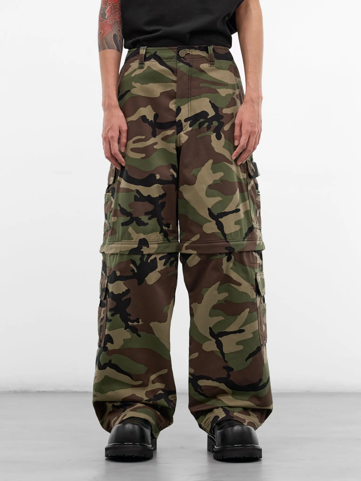 Green Camouflage Zip Cargo Pants (ME76PA096XE-GREEN-CAMO) sold by lorenzo