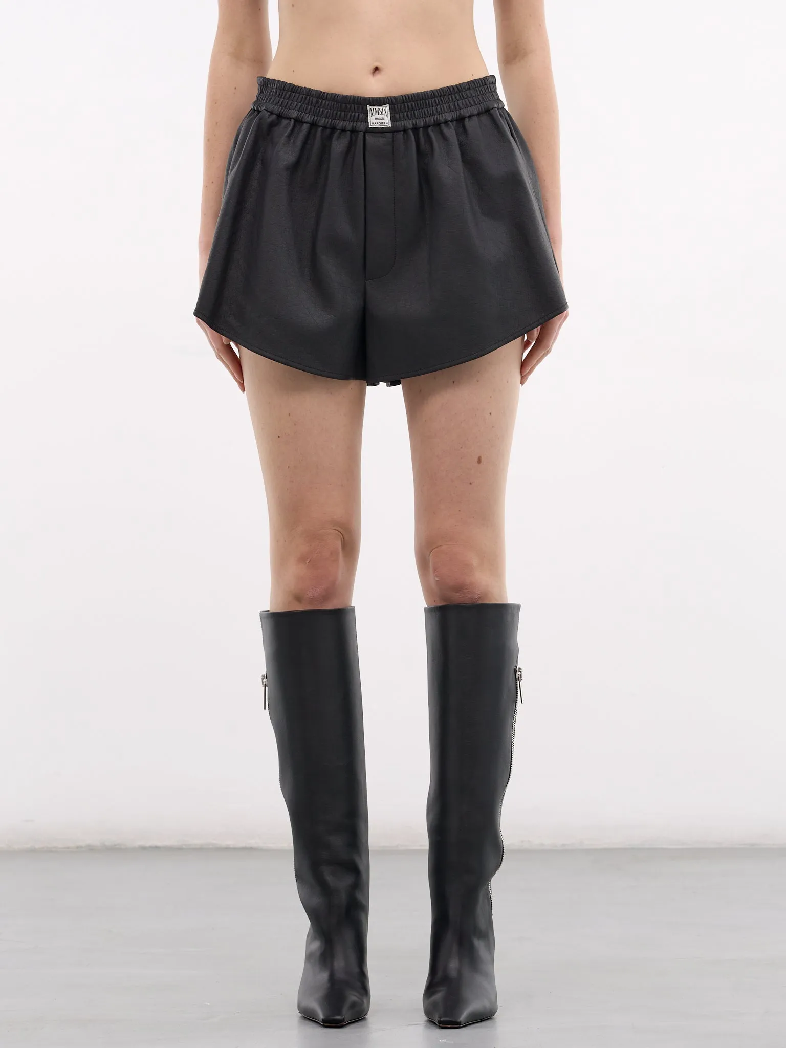 Black Vegan Leather Mini Shorts (S52MU0134-M35740-900-BLACK) sold by lorenzo