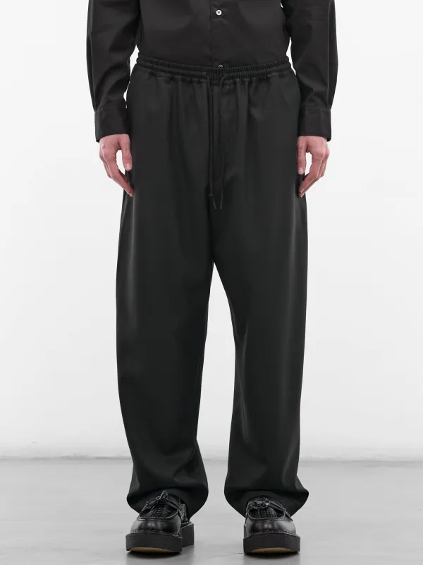 Black Wool Drawstring Trousers (HQ-P009-S26-BLACK) made by Comme des Garcons