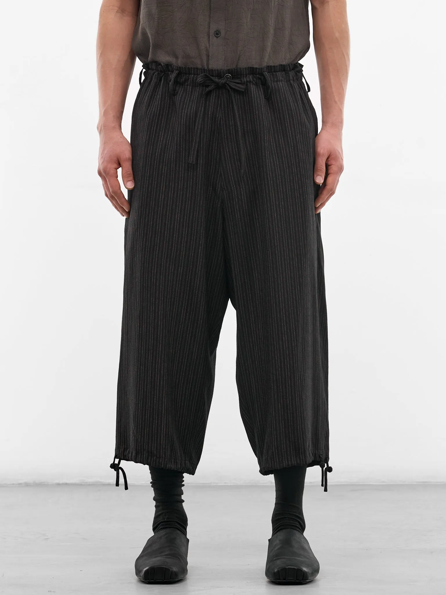 Black Striped Cropped Wide Trousers (HK-P54-227-1-BLACK) sold by lorenzo