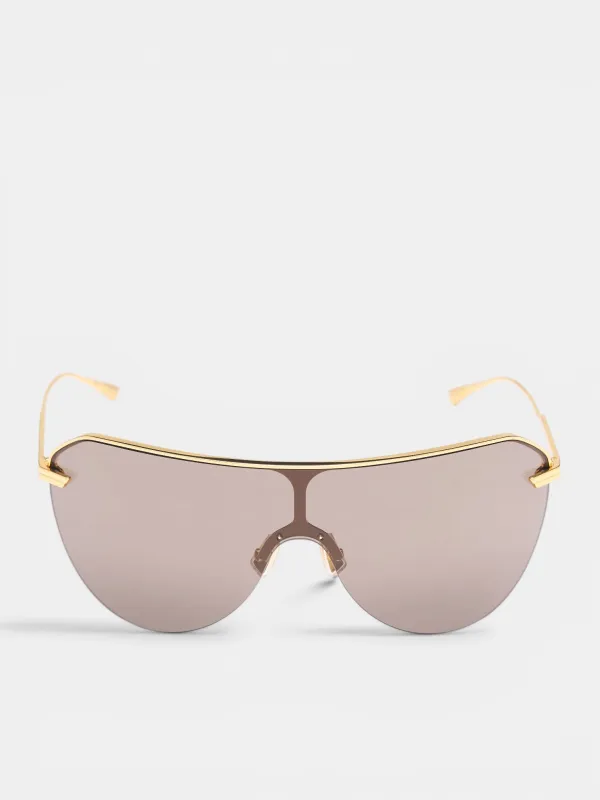 Gold Rimless Shield Sunglasses (A002LDV4450-1251-GOLD-BROWN) made by Bottega Veneta