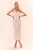 Darion Scallop Lace Bow Midi Skirt sold by LoveShackFancy