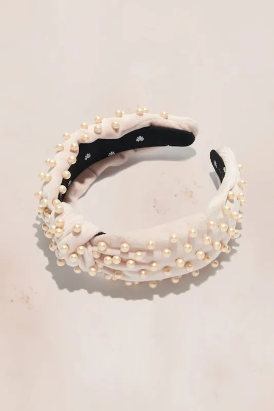 Lele Sadoughi Velvet Pearl Knotted Headband sold by LoveShackFancy