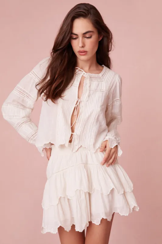 Sanra Embroidered Blouse sold by LoveShackFancy