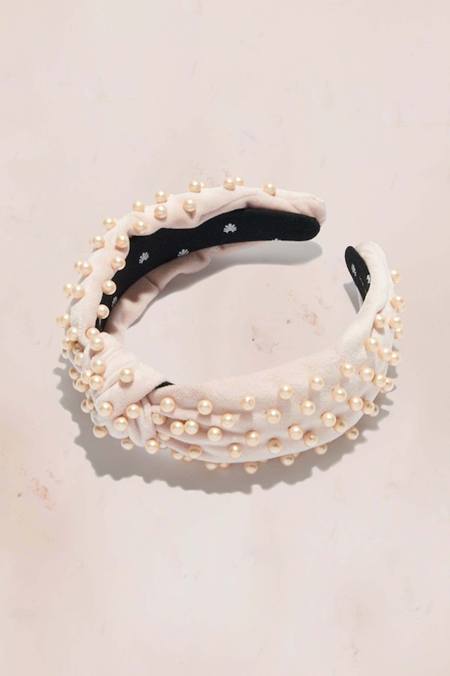 Lele Sadoughi Velvet Pearl Knotted Headband sold by LoveShackFancy