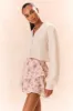 Ruffle Mini Lace-Trimmed Floral Skirt sold by LoveShackFancy