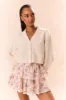 Ruffle Mini Lace-Trimmed Floral Skirt sold by LoveShackFancy