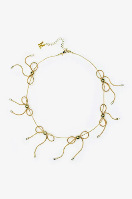 Marland Backus Gold Bow Necklace sold by LoveShackFancy