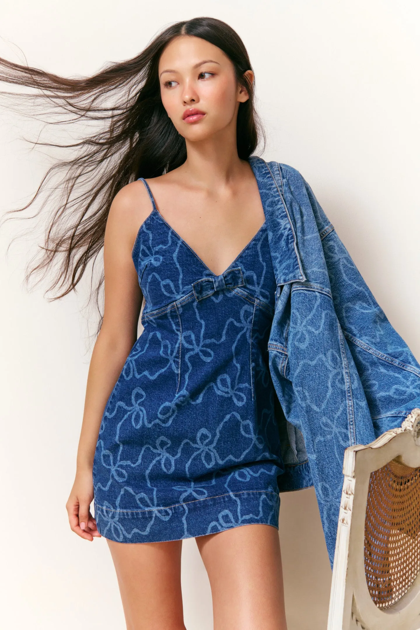 Solina Denim Bow Mini Dress sold by LoveShackFancy