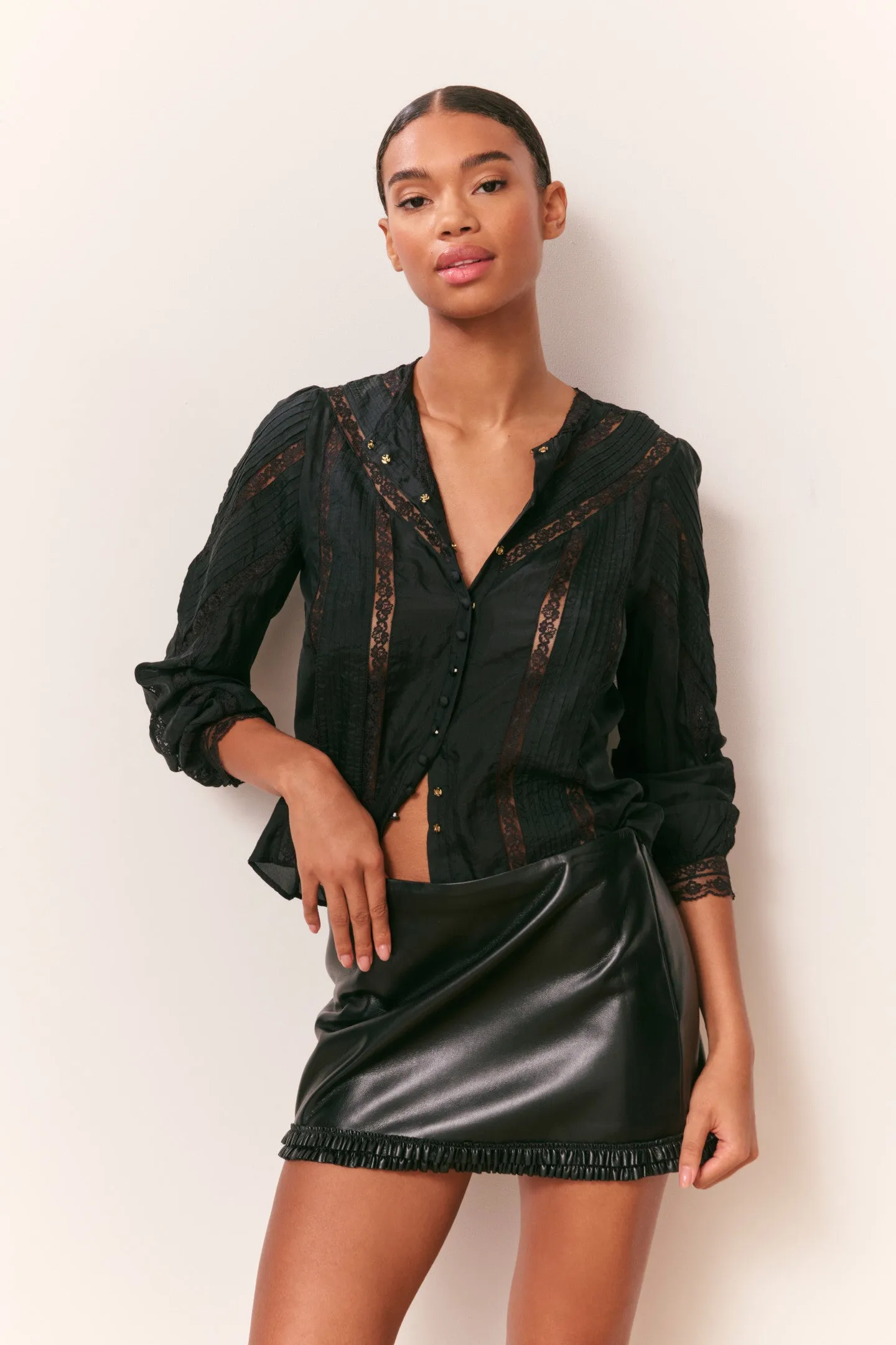 Noala Faux Leather Mini Skirt sold by LoveShackFancy