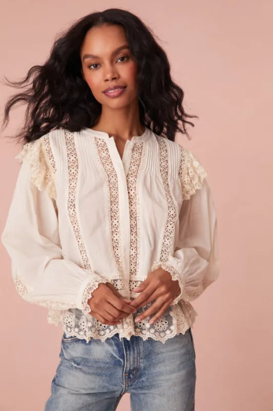 Kava Cotton Ruffle Long Sleeve Blouse sold by LoveShackFancy