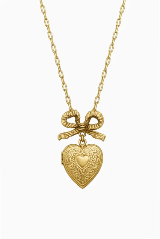 Miss Ellie Bow and Etched Heart Locket Necklace made by LoveShackFancy