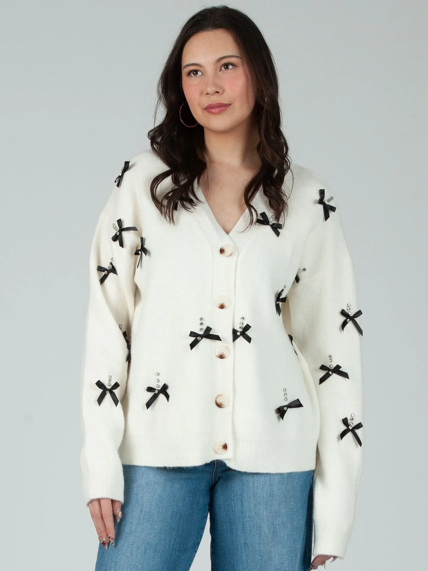 Women's Rhinestone & Bow Cardigan sold by Lucca Couture