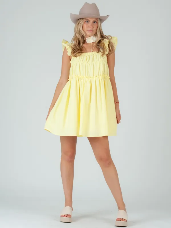 JESSIE FLUTTER SHOULDER MINI DRESS-CANARY sold by Lucca Couture
