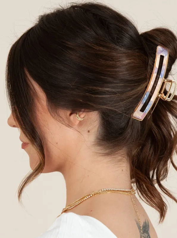 SPACE HAIR CLAW sold by Lucca Couture