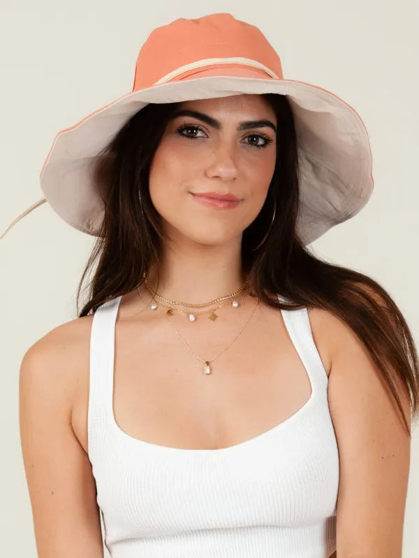 MIRANDA REVERSIBLE BUCKET HAT-D. CORAL sold by Lucca Couture