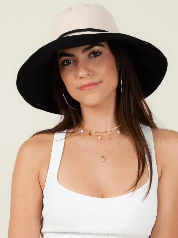 MIRANDA REVERSIBLE BUCKET HAT-BEIGE sold by Lucca Couture