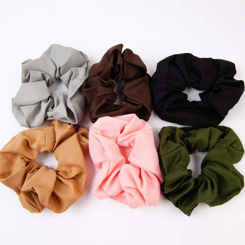 FOLLOW SCRUNCHIE sold by Lucca Couture