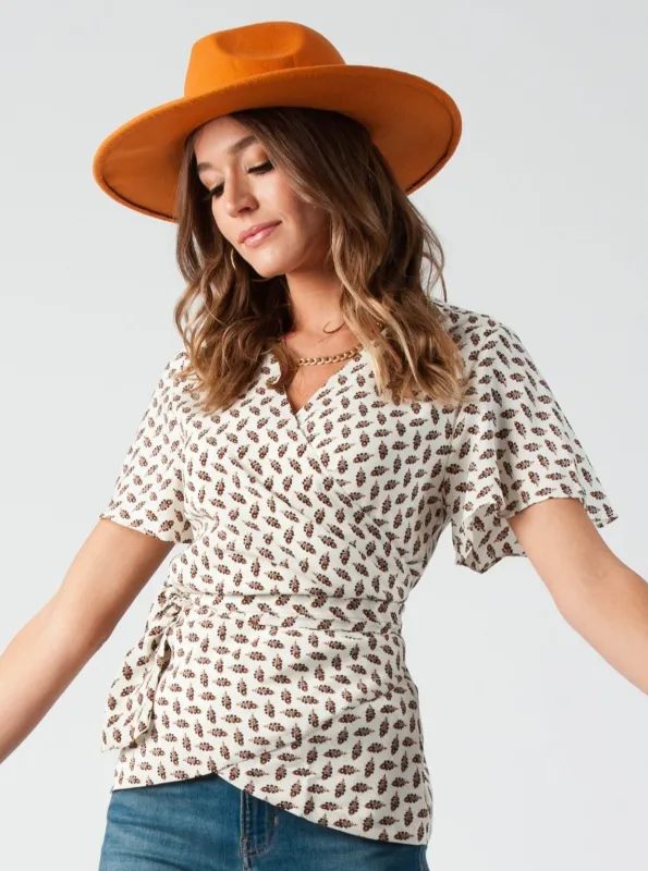 FARIS WRAP TOP-VANILLA LEAF sold by Lucca Couture