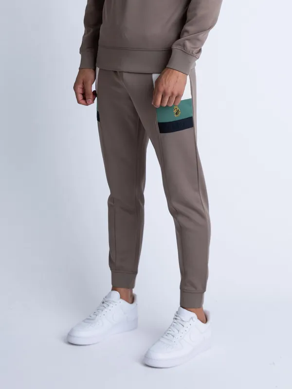 COSMOS TRICOT CUFFED JOGGERS sold by Luke 1977