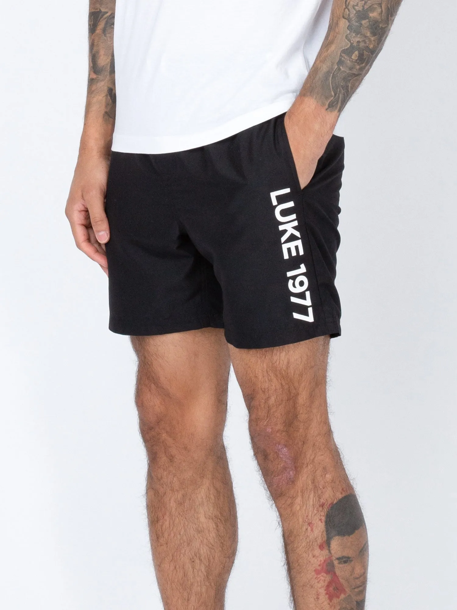 SIDE ON SWIM SHORTS sold by Luke 1977
