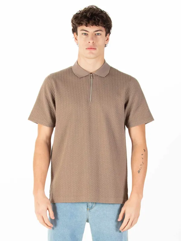 WAFFLE ON JACQUARD TEXTURED ZIP POLO sold by Luke 1977