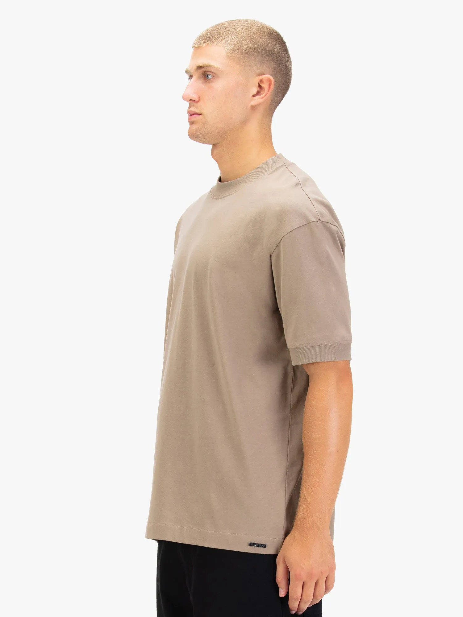 WHO WEARS THE RELAXED FIT T-SHIRT sold by Luke 1977 product image thumbnail 3
