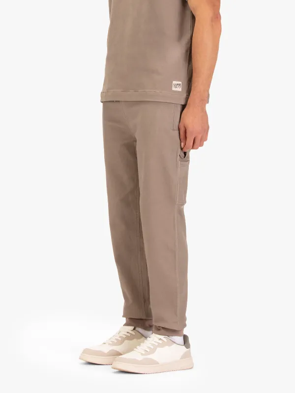 DOWEL CARPENTER JOGGERS sold by Luke 1977