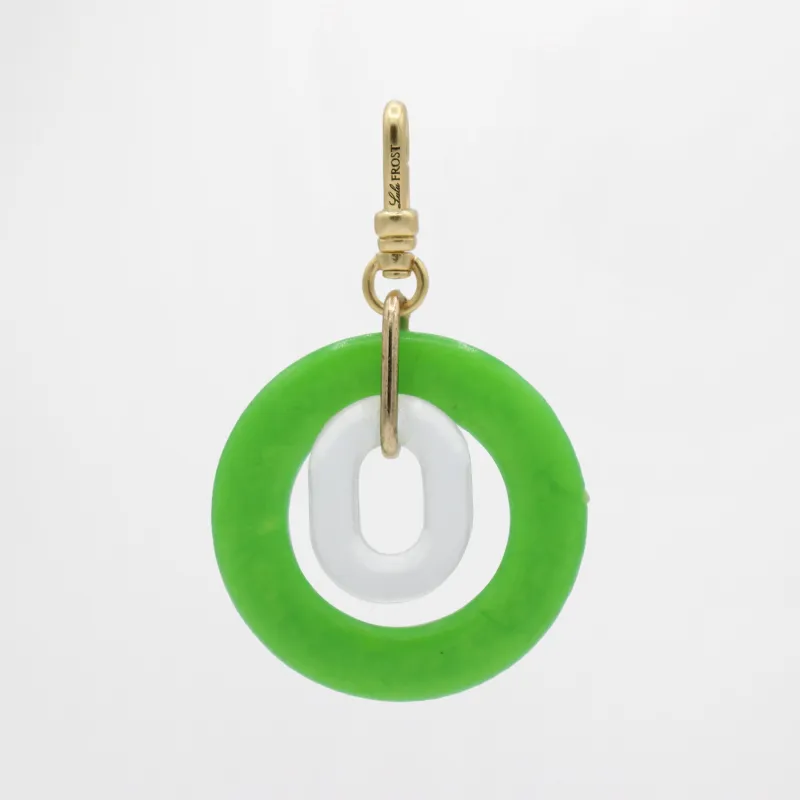 St. Paddy’s Day Vibrant Green Bakelite Double Disc Lucky Charm sold by Lulu Frost