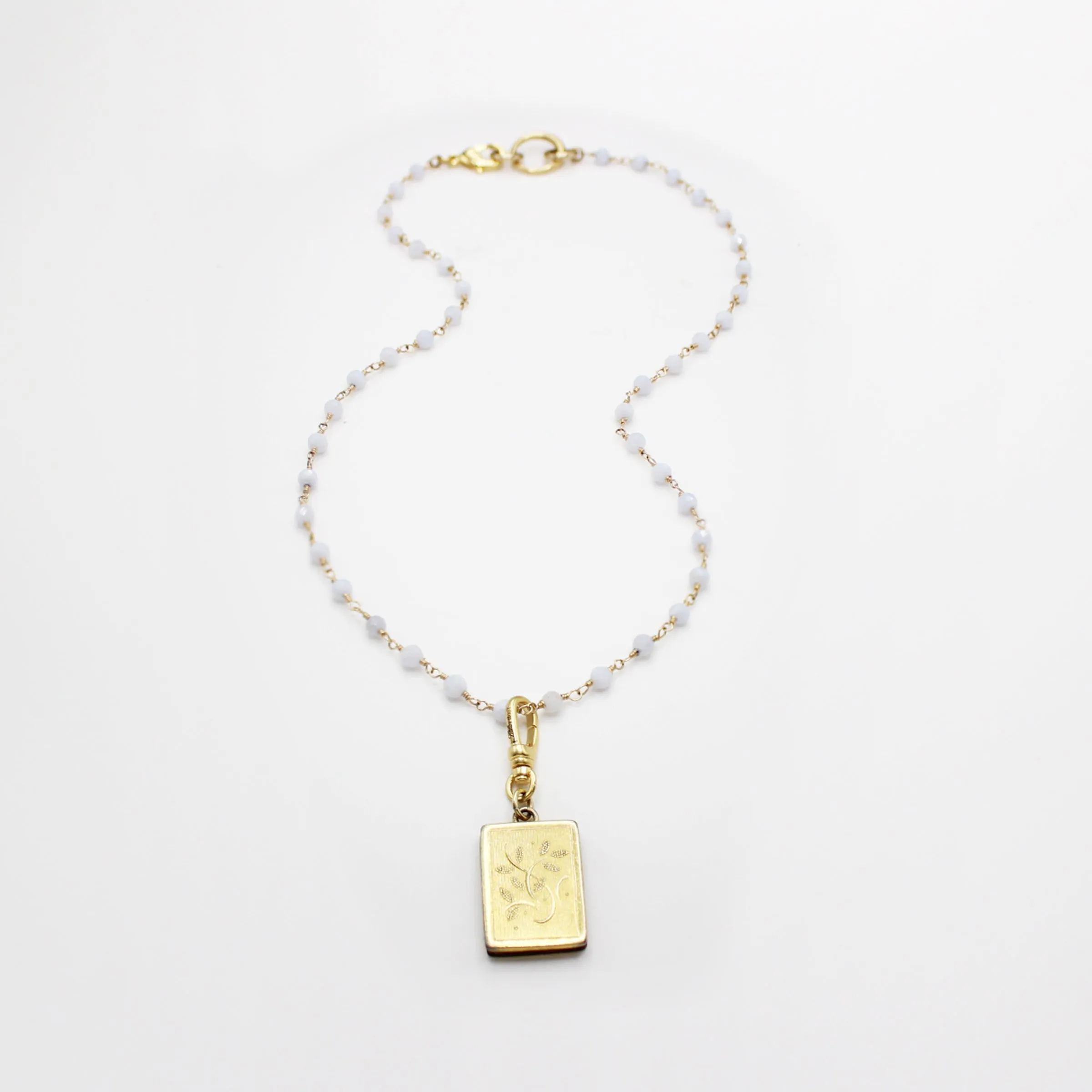 Antique Floral Scrolled Pinstripe Locket in 10kt Goldfill Betsy Charm sold by Lulu Frost