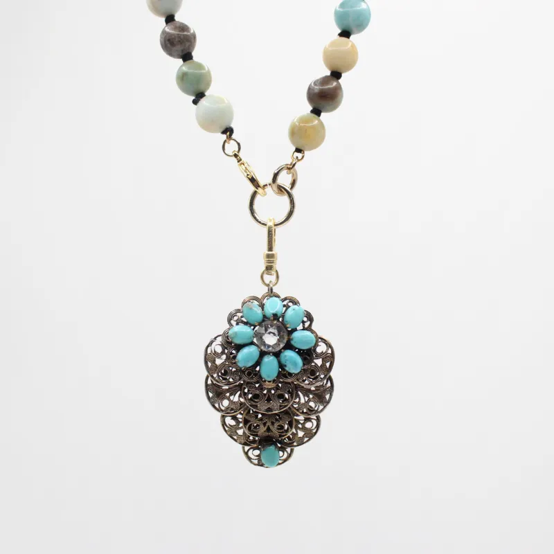 Vintage Floral Filigree Charm on Handknotted Amazonite Beaded Necklace sold by Lulu Frost