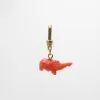 Elizabeth Antique C0ral Handcarved Elephant Trunk Up Charm sold by Lulu Frost