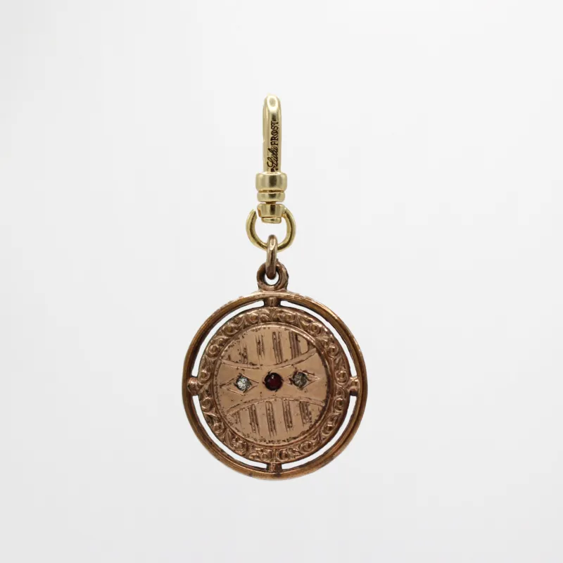 Elizabeth Antique Victorian 10 Karat Goldfill Ruby Red Glass Paste Circular Medallion Charm sold by Lulu Frost