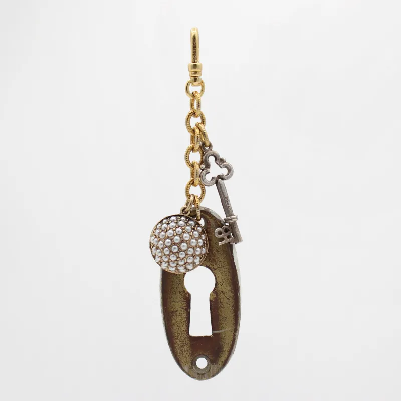 Vintage Elements Cluster Key to the Lock Charm sold by Lulu Frost